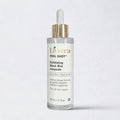 Livvera Exfoliating Black Rice Ampoule bottle on a white background