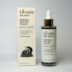 Livvera Exfoliating Black Rice Ampoule bottle and packaging on a gray background