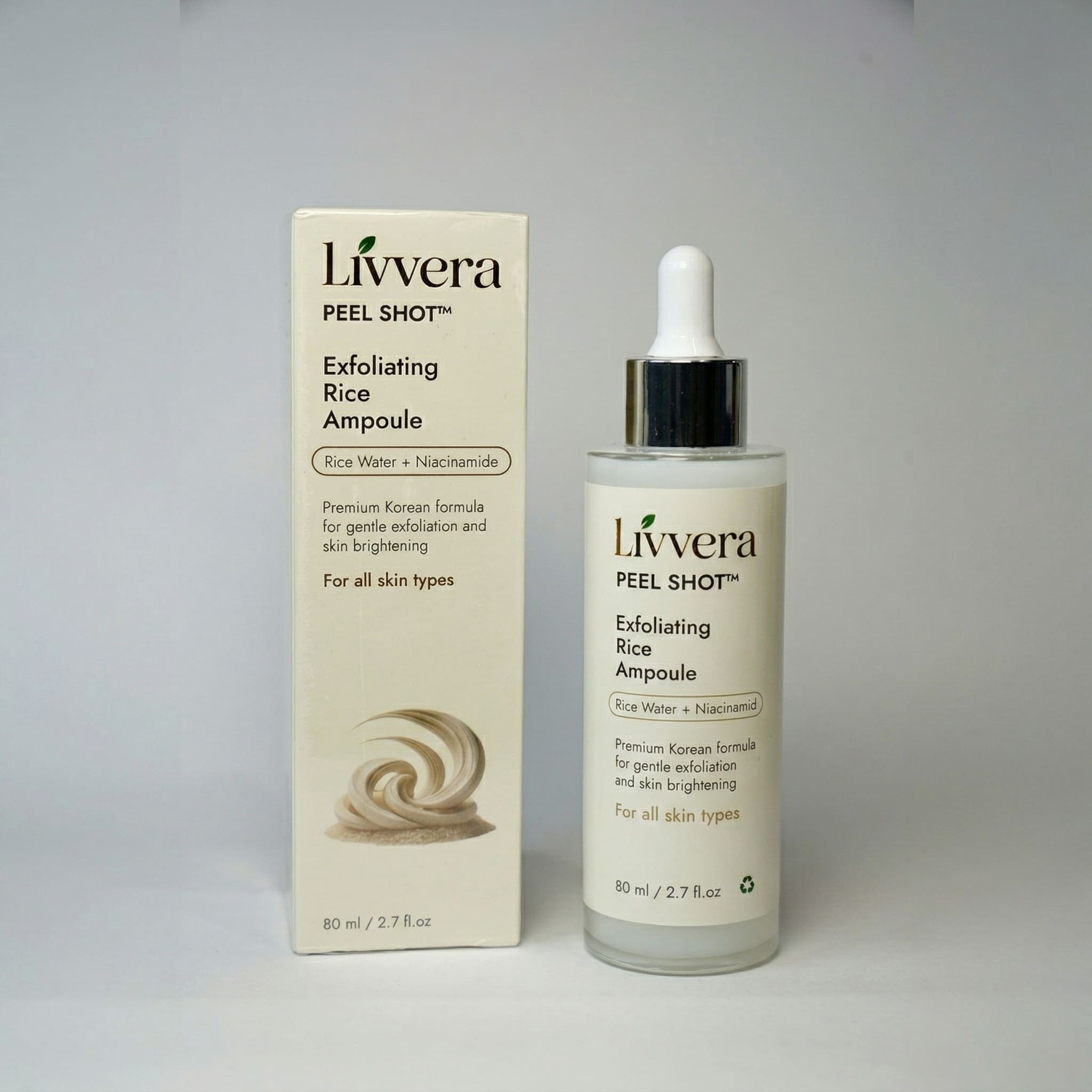 Livvera Exfoliating Rice Ampoule bottle and packaging on a gray background